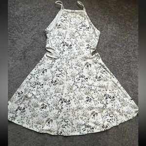 Floral Mini Dress with Cutout Sides from Garage clothing. Size Small.